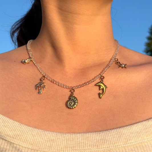 Crystal clear quartz Necklace with golden ocean charms